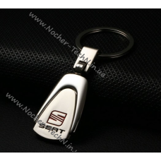 Авто брелок Seat (Сеат) на ключі, овальний, сталевий - брелок на подарунок